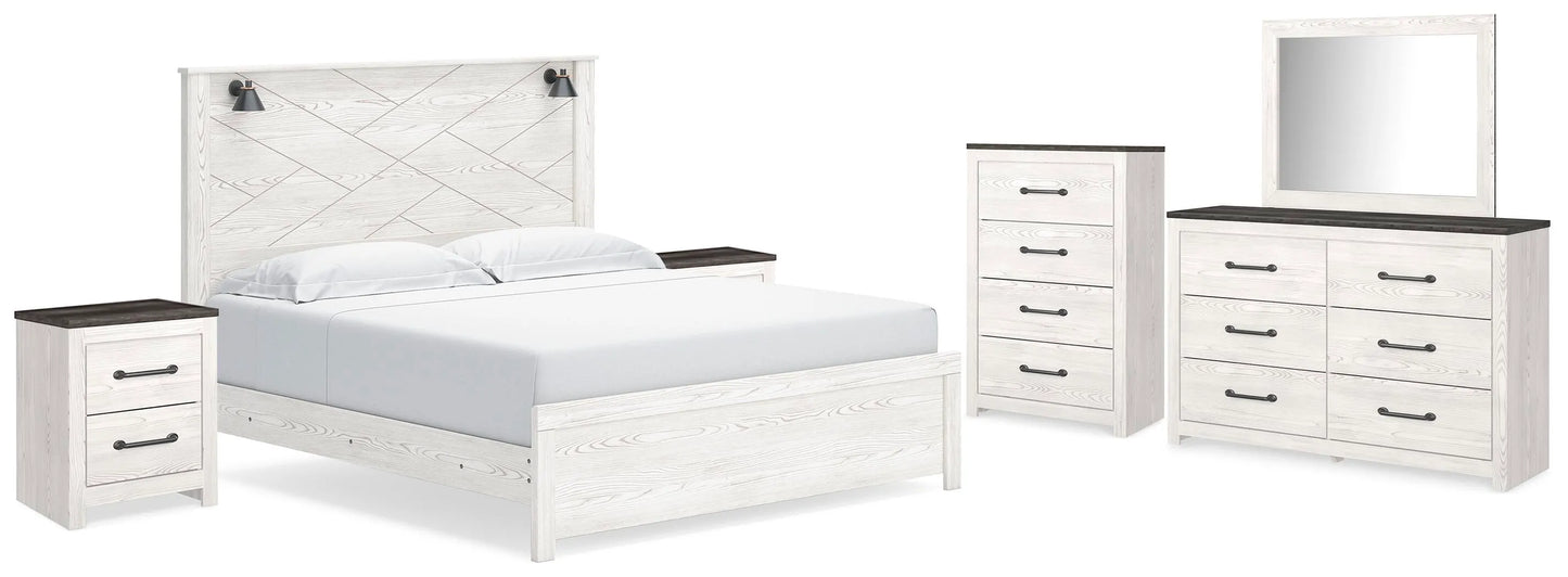 Cama Gerridan King con paneles, tocador, espejo, cómoda y dos mesitas de noche