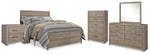 Cama Queen Culverbach con paneles, tocador, espejo, cómoda y dos mesitas de noche