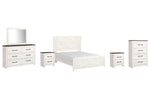 Cama Queen Gerridan con paneles, tocador, espejo, cómoda y dos mesitas de noche