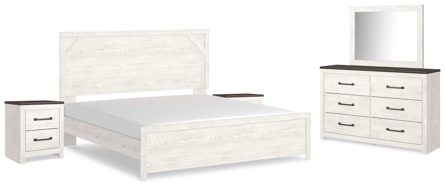 Cama Gerridan King con paneles, tocador, espejo y dos mesitas de noche