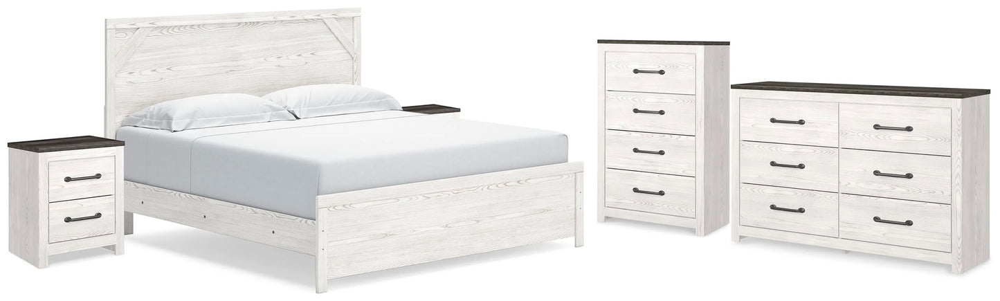 Cama King Gerridan con paneles, cómoda, arcón y dos mesitas de noche