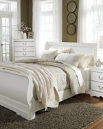 Cama Anarasia Queen tipo trineo con cómoda y mesita de noche