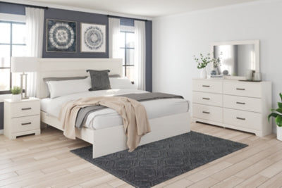 Cama Stelsie King con paneles, tocador, espejo y mesita de noche