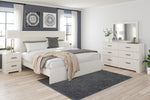 Cama Stelsie King con paneles, tocador, espejo y mesita de noche