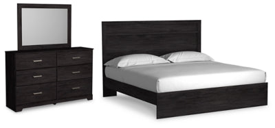 Cama King Belachime con paneles, cómoda y espejo