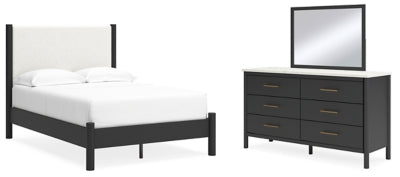 Cama Cadmori con paneles tapizados, cómoda y espejo