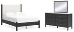 Cama Cadmori con paneles tapizados, cómoda y espejo