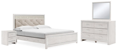 Cama King Altyra con paneles tapizados, tocador, espejo y mesita de noche