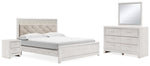 Cama King Altyra con paneles tapizados, tocador, espejo y mesita de noche