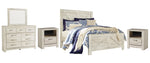 Cama Queen Bellaby con paneles en forma de cruz, tocador, espejo y dos mesitas de noche