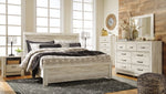 Cama Bellaby King con paneles, tocador, espejo, cómoda y dos mesitas de noche
