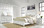 Cama King Kanwyn con paneles, tocador, espejo y mesita de noche